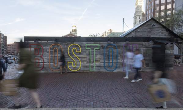 Boston sign over a wall outside City Hall Plaza