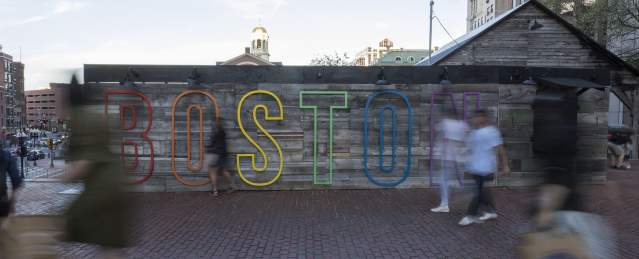 Boston sign over a wall outside City Hall Plaza