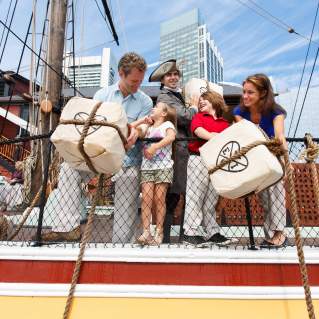 Boston Tea Party Ships & Museum - Family Throwing Tea
