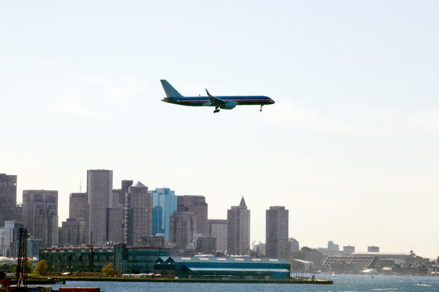 gettinghere_airplaneovercity