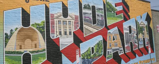 Mural reading Greetings from Hyde Park